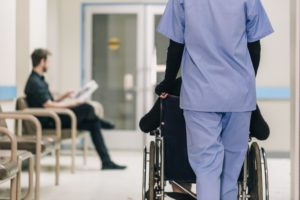 nurse-pushing-wheelchair